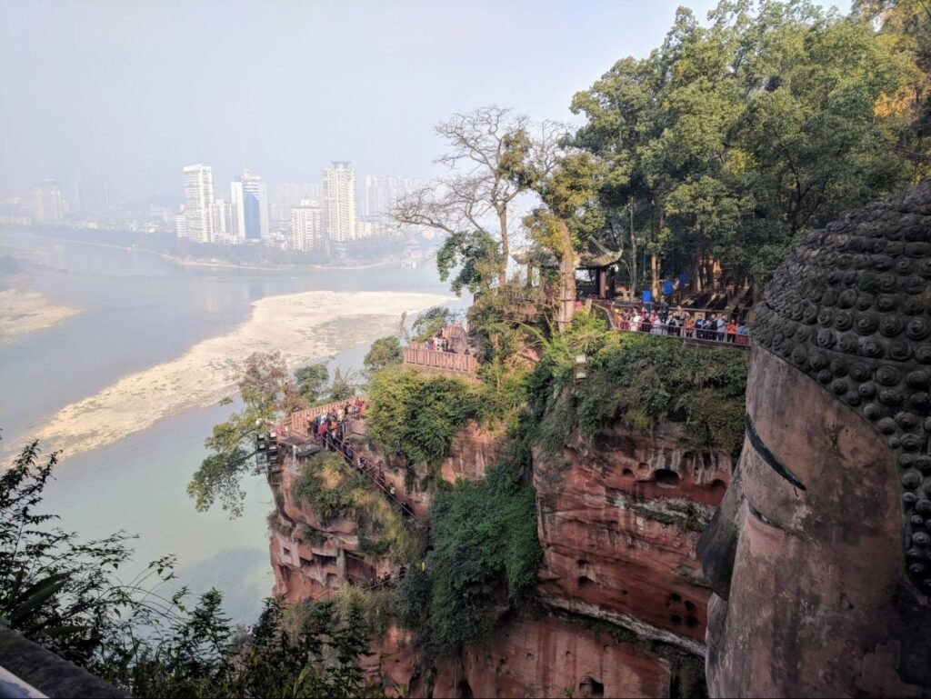 Leshan Giant Buddha overlooking the modern skyline